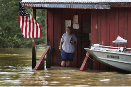 fot. Joe Raedle, USA. 2. miejsce w kategorii Wydarzenia Bieżące

"Louisiana Flooding" - historyczna powódź, spowodowana przez masywne opady deszczu spowodowała śmierć 13 osób i zniszczyła tysiące domów w niektórych częściach stanu Louisiana.