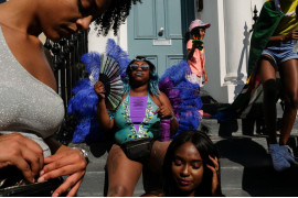 fot. Olesia Kim, "Londoners", 1. miejsce w kat. Street Photography / Siena International Photo Awards 2020<br></br><br></br>Uczestnicy festiwalu Notting Hill Carnival.