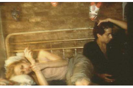 "Greer and Robert on the bed", NYC 1983, Cibachrome print, Copyright Nan Goldin. Courtesy Matthew Marks Gallery, New York