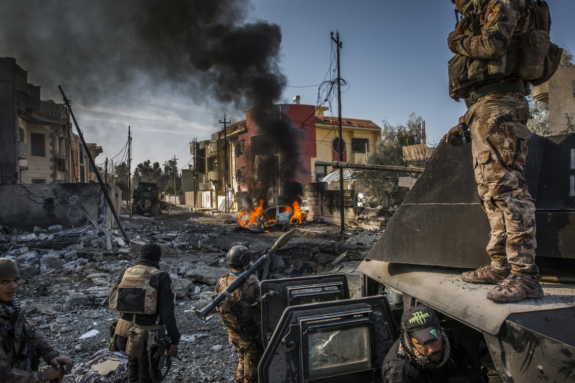 © Ivor Prickett (The New York Times), "The Battle for Mosul" - I miejsce w kategorii GENERAL NEWS STORIES / Na początku lipca, po miesiącach walk, rząd Iraku ogłosił, że miasto Mosul zostało w pełni wyzwolone od ISIS, chociaż konflikt trwał nadal w zakamarkach miasta. Tysiące cywilów zginęło podczas bitwy o Mosul, podczas gdy duże obszary miasta zostały zniszczone.