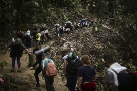 Migranci przechodzą przez Darién Gap z Kolumbii do Panamy w nadziei na dotarcie do USA, wtorek, 9 maja 2023 r. (AP Photo/Ivan Valencia)