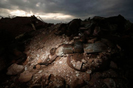Tomasz Woźny. Haiti. Ofiary trzęsienia ziemi. Masowe groby w Titanyen. 27 stycznia 2010