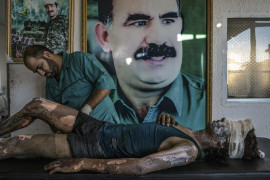 1. miejsce w kategorii "General News", fot. Mauricio Lima // Bojownik SIS opatrywany w kurdyjskim szpitalu