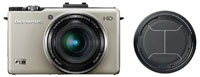 Olympus XZ-1 w kolorze srebrnym oraz nowa zakrywka obiektywu