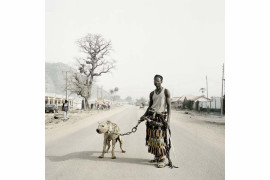 I nagroda w kategorii Portret (zdjęcie pojedyncze), Pieter Hugo, RPA, Corbis, Mallam Gahadima Ahamadu z hieną Jamis, Abuja, Nigeria