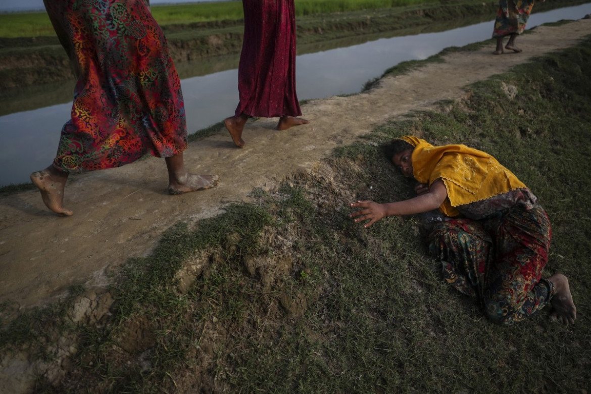 Nagroda Pulitzer 2018 w kategorii Feature Photography - redakcja fotograficzna Reuters | Zdjęcia ukazują przemoc, z jaką spotkali się uchodźcy Rohingya uciekając z Birmy.