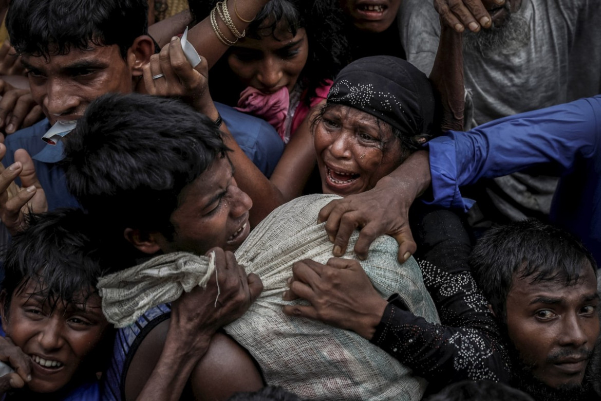 Nagroda Pulitzer 2018 w kategorii Feature Photography - redakcja fotograficzna Reuters | Zdjęcia ukazują przemoc, z jaką spotkali się uchodźcy Rohingya uciekając z Birmy.