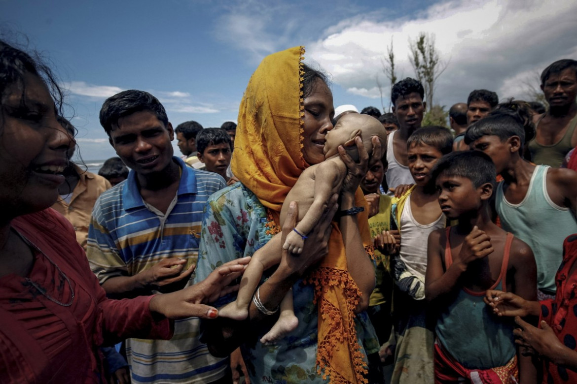 Nagroda Pulitzer 2018 w kategorii Feature Photography - redakcja fotograficzna Reuters | Zdjęcia ukazują przemoc, z jaką spotkali się uchodźcy Rohingya uciekając z Birmy.